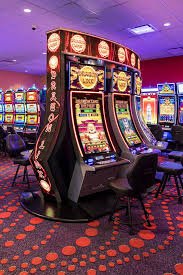 Mobile phone screen displaying live blackjack and roulette table options with player balance